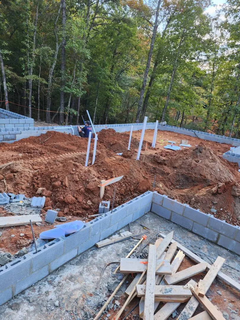 A pile of dirt in the middle of construction.