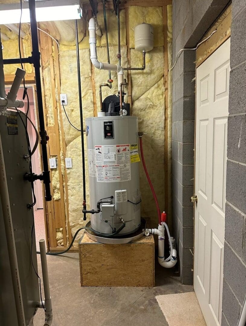 A water heater sitting in the middle of a room.